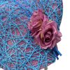 Showstopper headpiece in baby pink and baby blue.